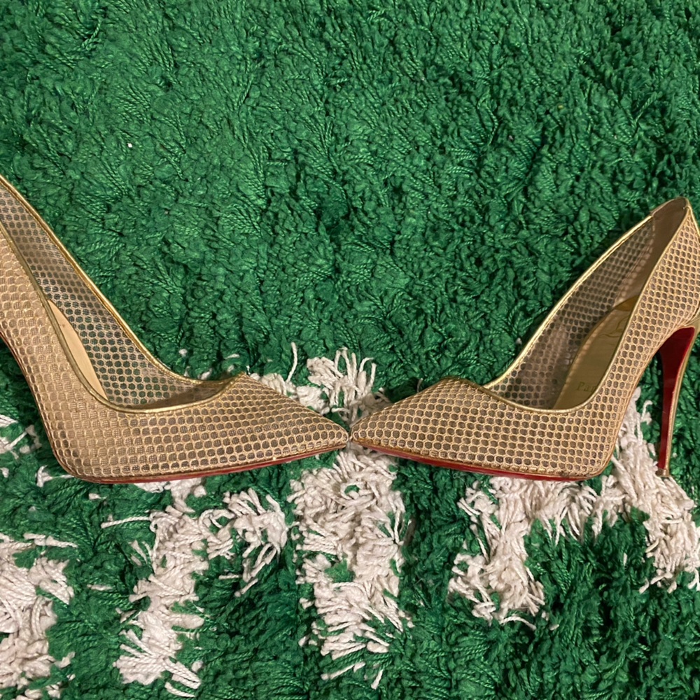Gold Christian Louboutin pump heels